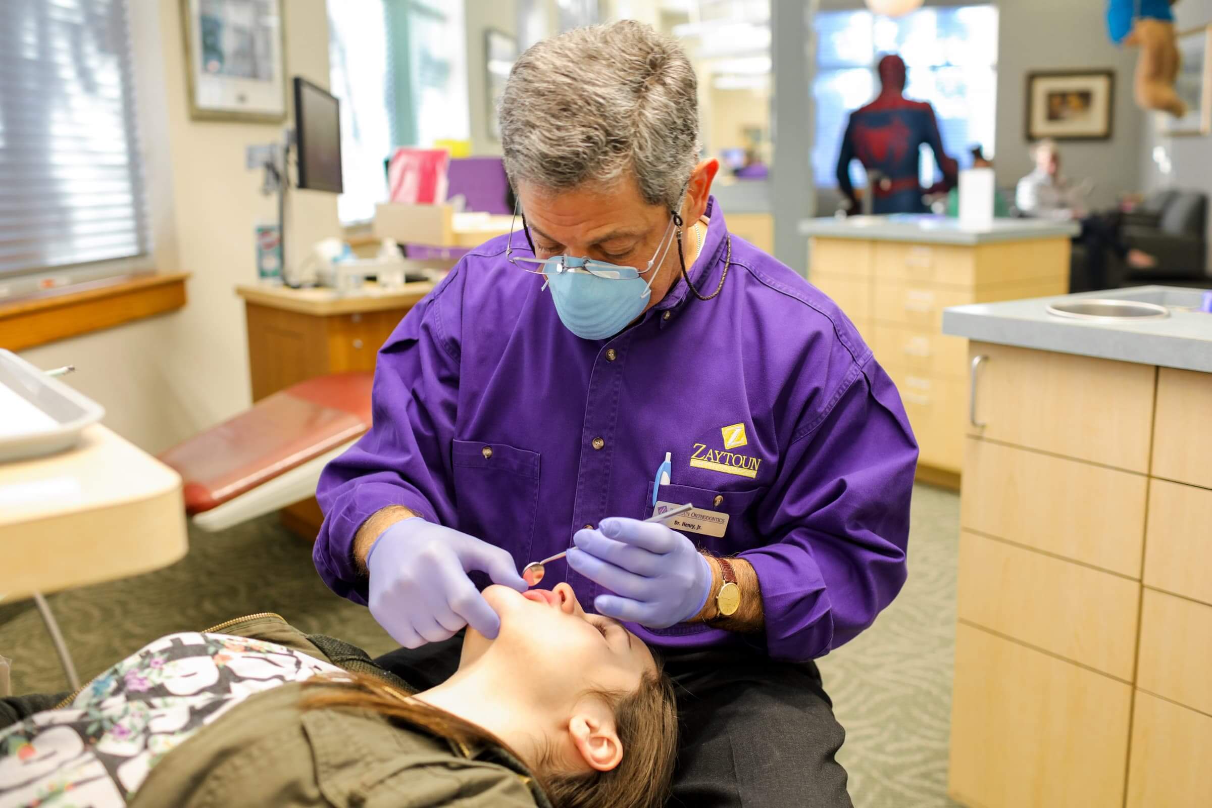 Doctor working on patient